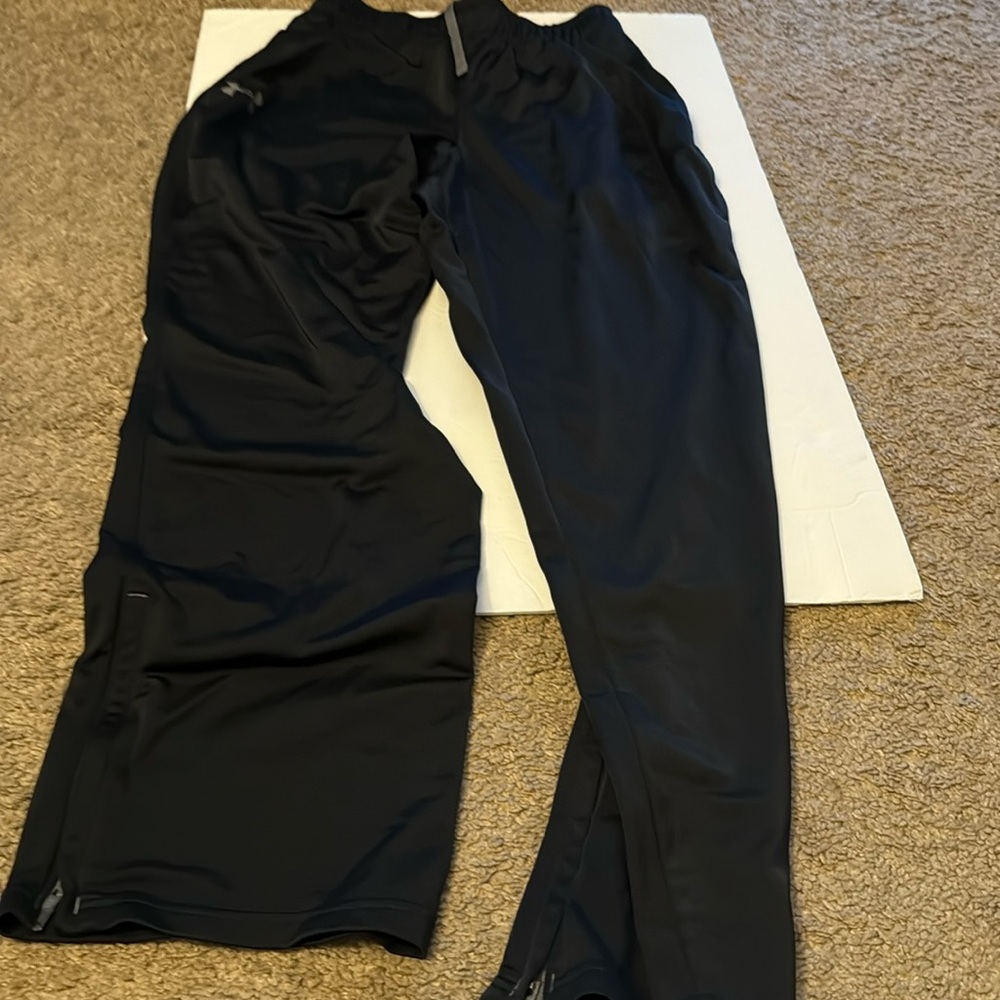 Under Armour Men’s track pants 
Small Black